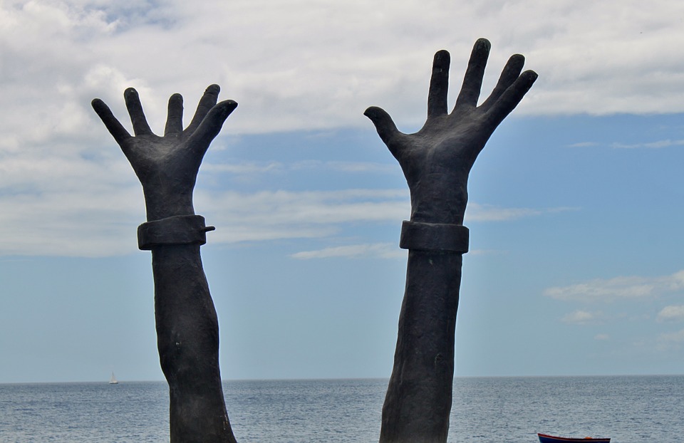Hands showing freedom from modern slavery