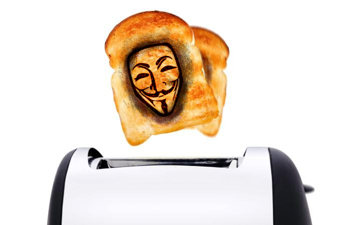Toaster with a mask coming out of the toaster